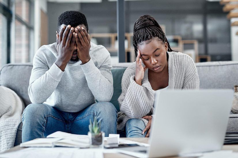 stress-anxiety-worry-with-young-couple-struggling-with-finance-debt-home-budget-living-room-man-woman-feeling-negative-depressed-with-inflation-loan-repayment_590464-81166